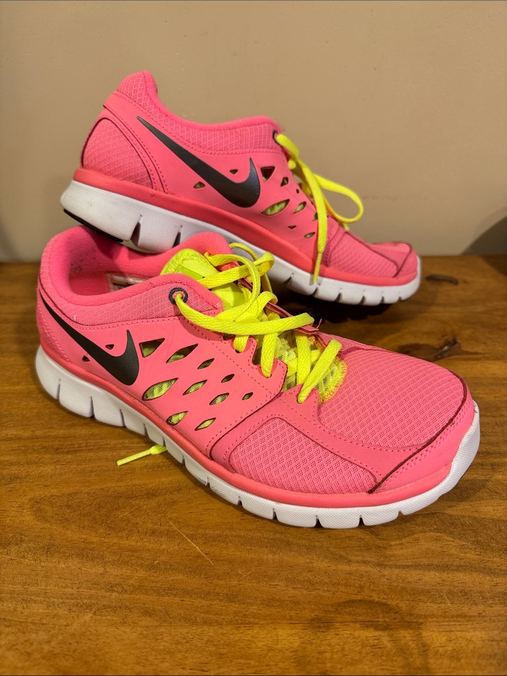 Nike Pink Athletic Sneakers with Neon Yellow Laces